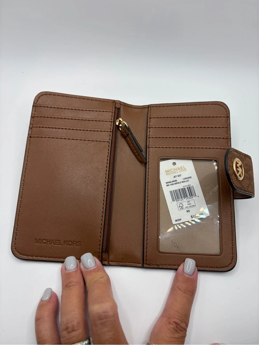 Michael Kors Cognac Pebbled Leather Continental Wallet with MK Logo Snap